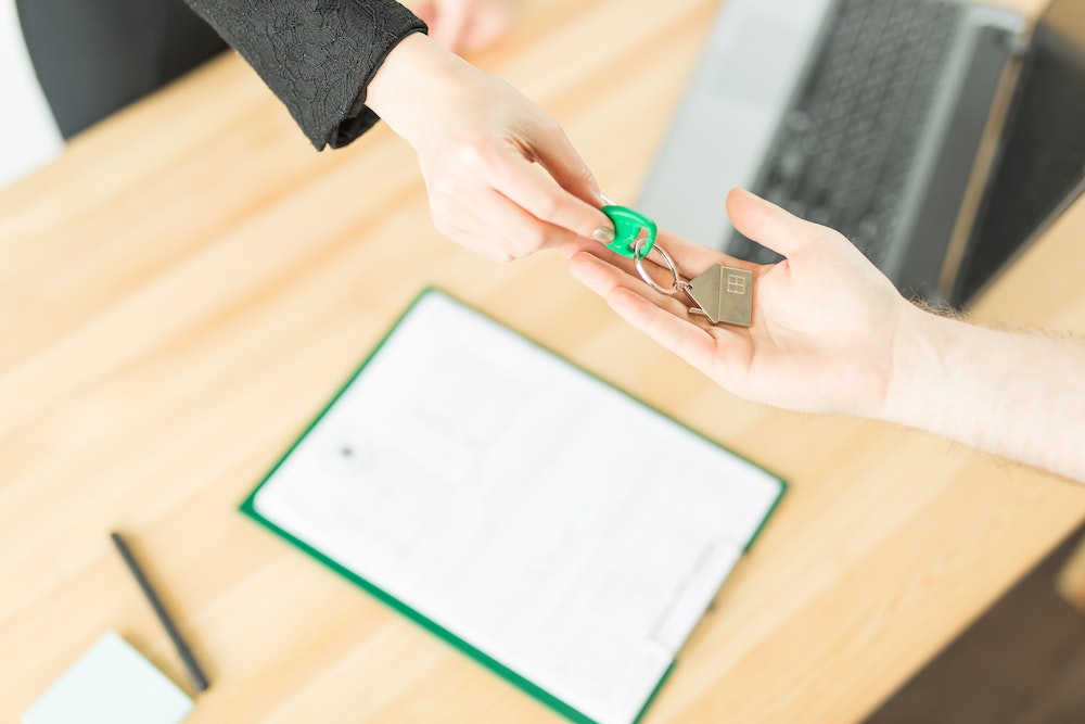 Comprendre le Contrat d'Achat Immobilier: Guide Complet pour l'Acquéreur